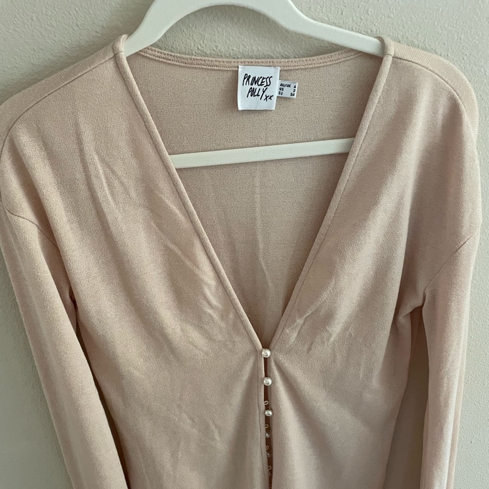 Princess Polly sweater with bell sleeves and pearl buttons